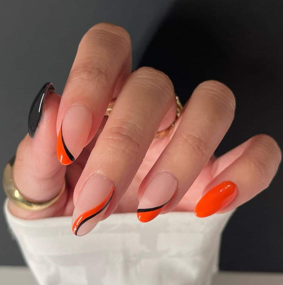 Orange Swirly Nails with a Touch of Black